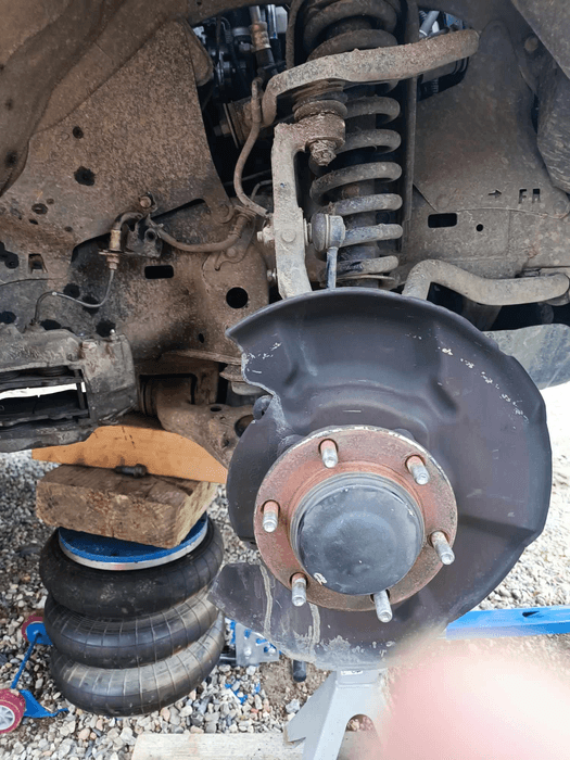 Changing front brake discs, calipers and pads on Toyota KDJ 120